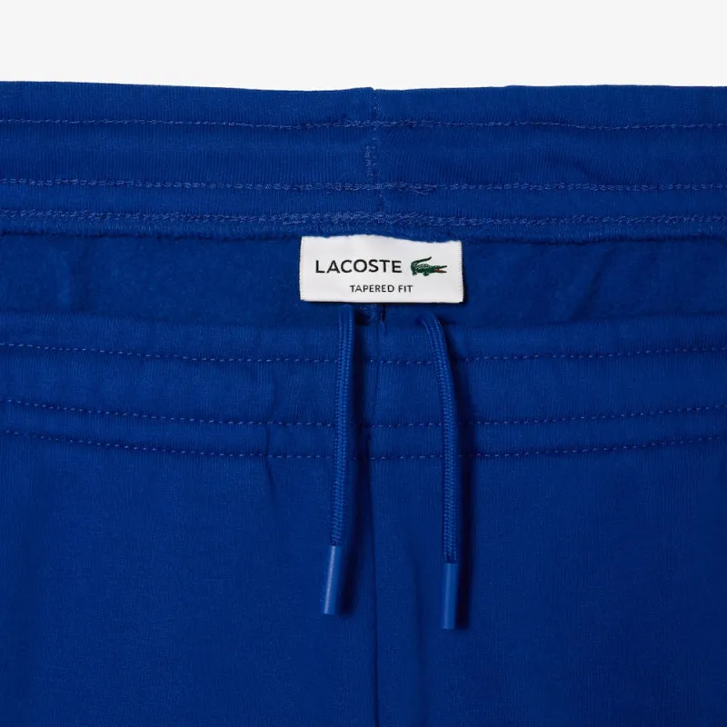 PANTALON DE SURVÊTEMENT COLOR-BLOCK LACOSTE BLEU ET BLEU MARINE