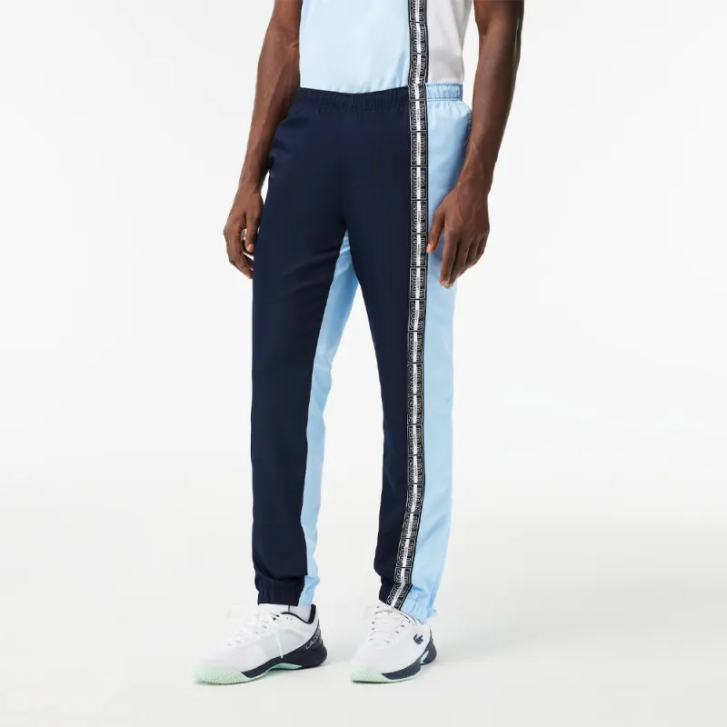 PANTALON DE SURVÊTEMENT LACOSTE TENNIS REGULAR FIT BLEU MARINE ET BLEU