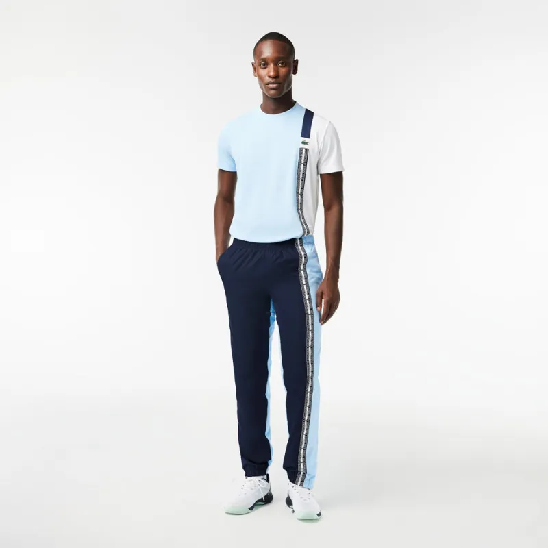 PANTALON DE SURVÊTEMENT LACOSTE TENNIS REGULAR FIT BLEU MARINE ET BLEU