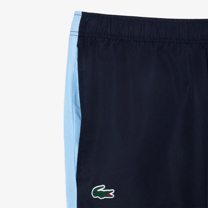 PANTALON DE SURVÊTEMENT LACOSTE TENNIS REGULAR FIT BLEU MARINE ET BLEU