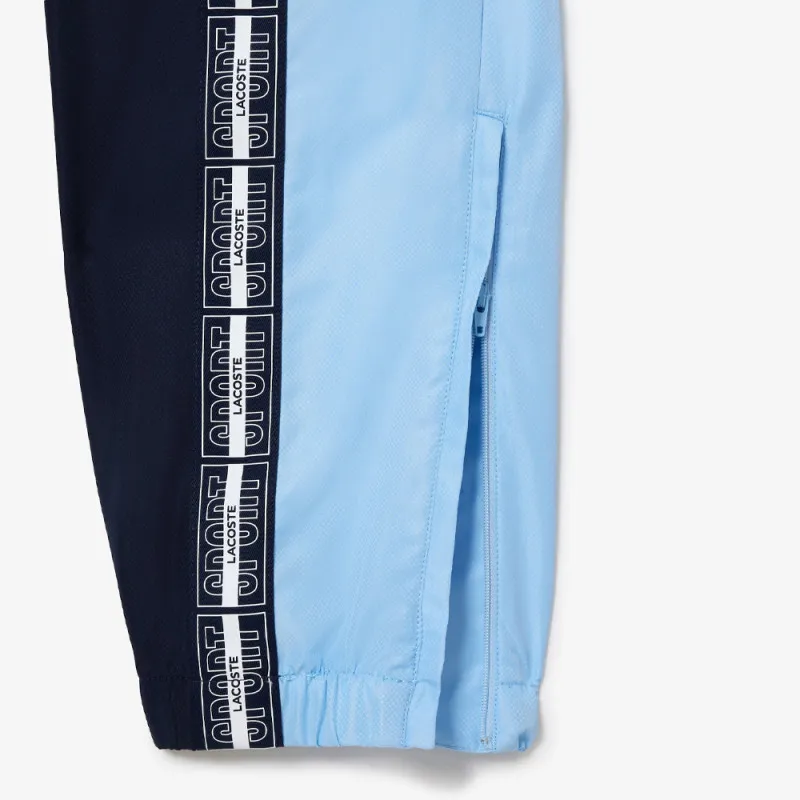 PANTALON DE SURVÊTEMENT LACOSTE TENNIS REGULAR FIT BLEU MARINE ET BLEU