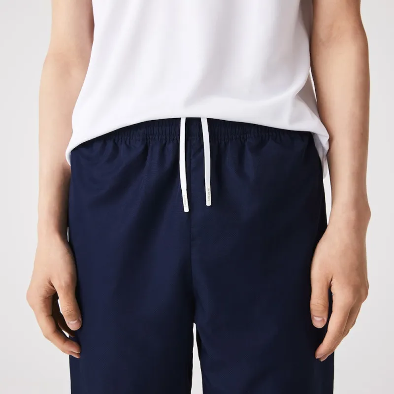 PANTALON DE SURVÊTEMENT UNI LACOSTE SPORT EN TISSU LEGER BLEU MARINE