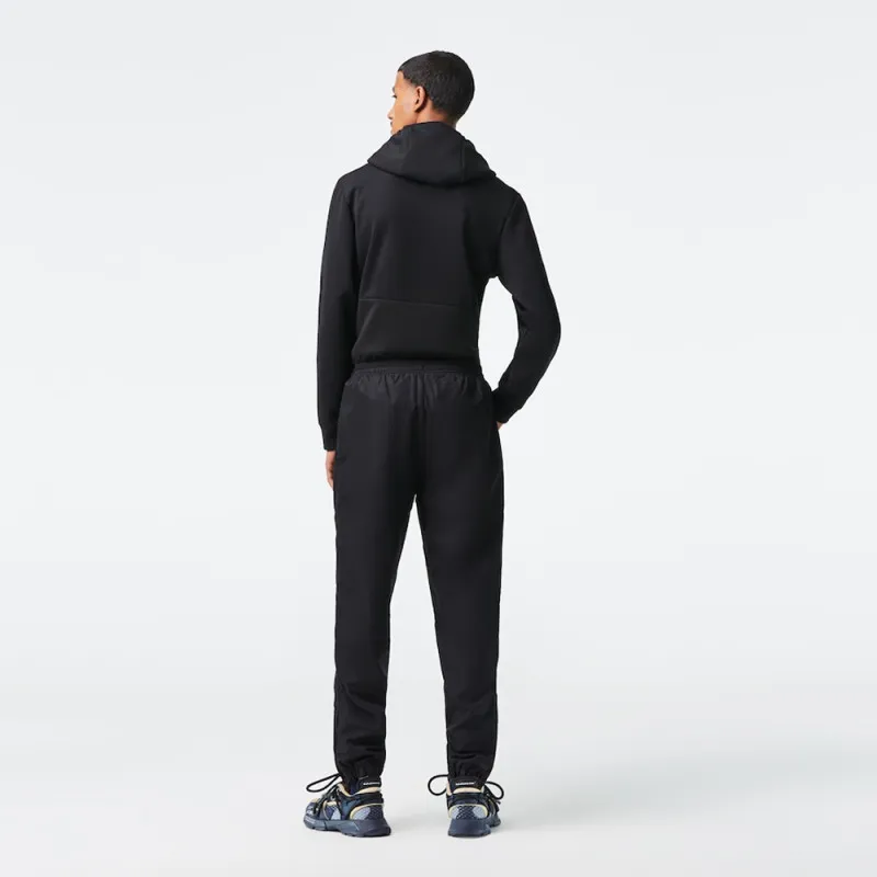 PANTALON DE SURVÊTEMENT UNI LACOSTE SPORT EN TISSU LEGER NOIR