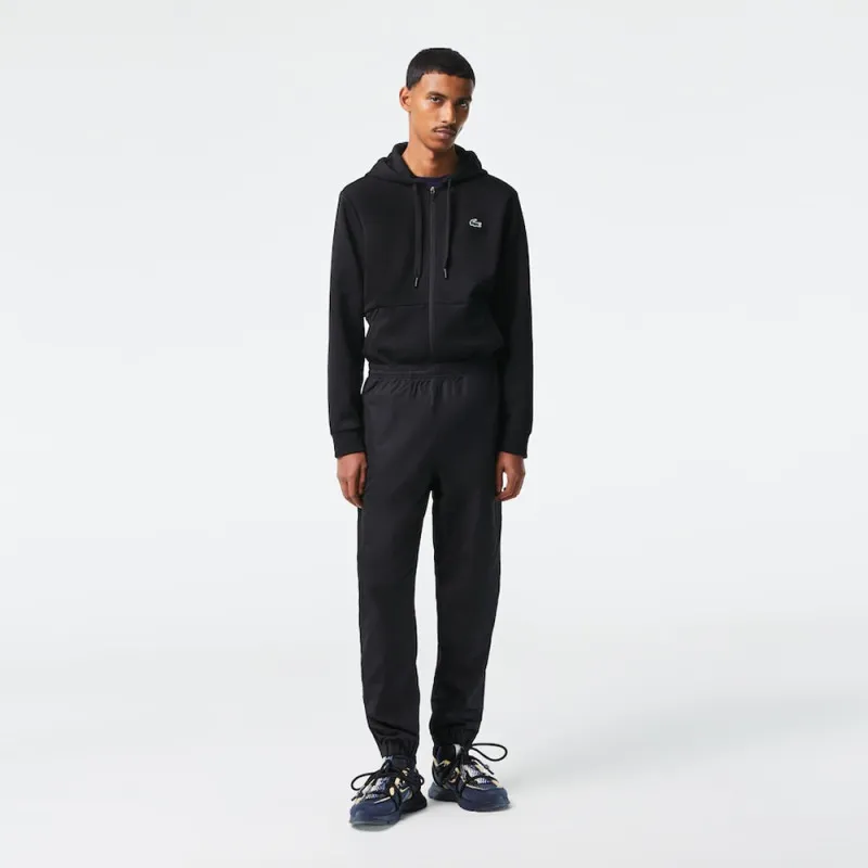 PANTALON DE SURVÊTEMENT UNI LACOSTE SPORT EN TISSU LEGER NOIR