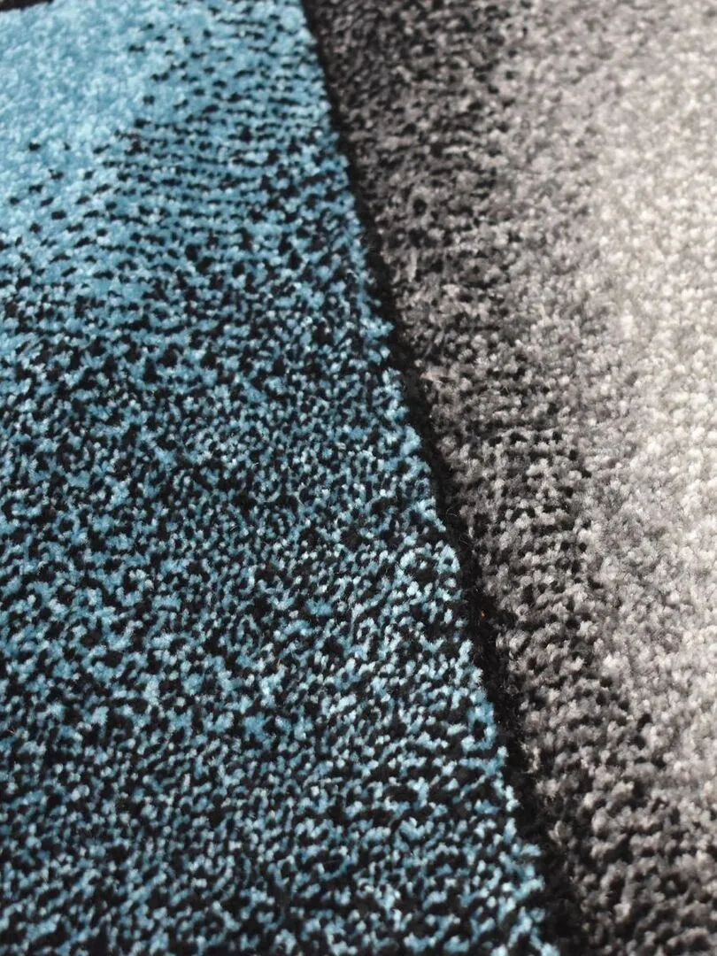 Tapis géométrique et asymétrique - Bleu turquoise